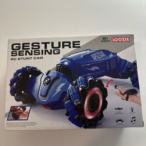 Futuristic Blue and Black Gesture Sensing Electronic Stunt Toy Car NIB